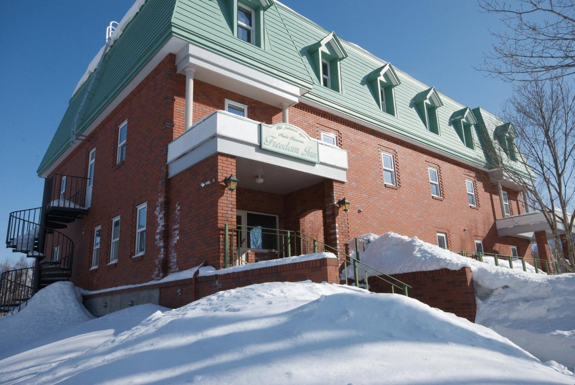 Niseko Freedom Inn Куттян Экстерьер фото